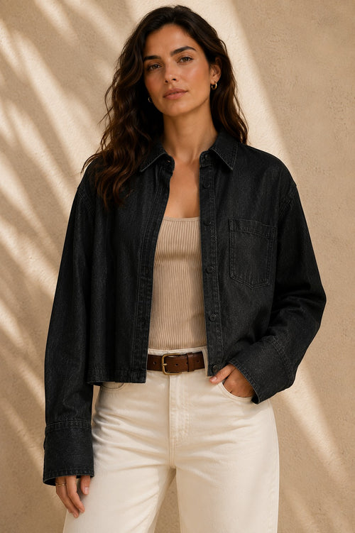 Model wearing a Second Soie black denim overshirt with a vintage Givenchy scarf back panel over a beige tank top.