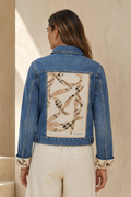 Second Soie denim jacket with vintage Burberry scarf back panel and convertible cuffs in beige, black, and red.