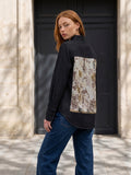 Second Soie reworked washed-black denim overshirt with a floral cotton scarf panel on the back, worn by a model.