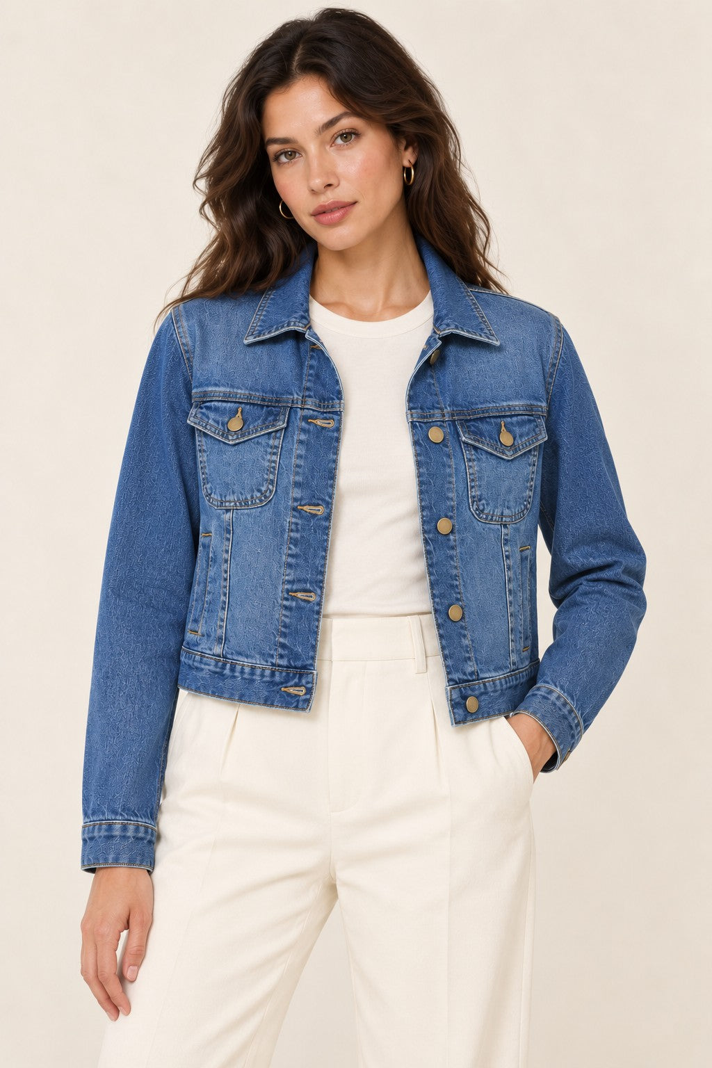 Model wearing a Second Soie medium-wash denim jacket with aged-brass buttons and a classic collar.