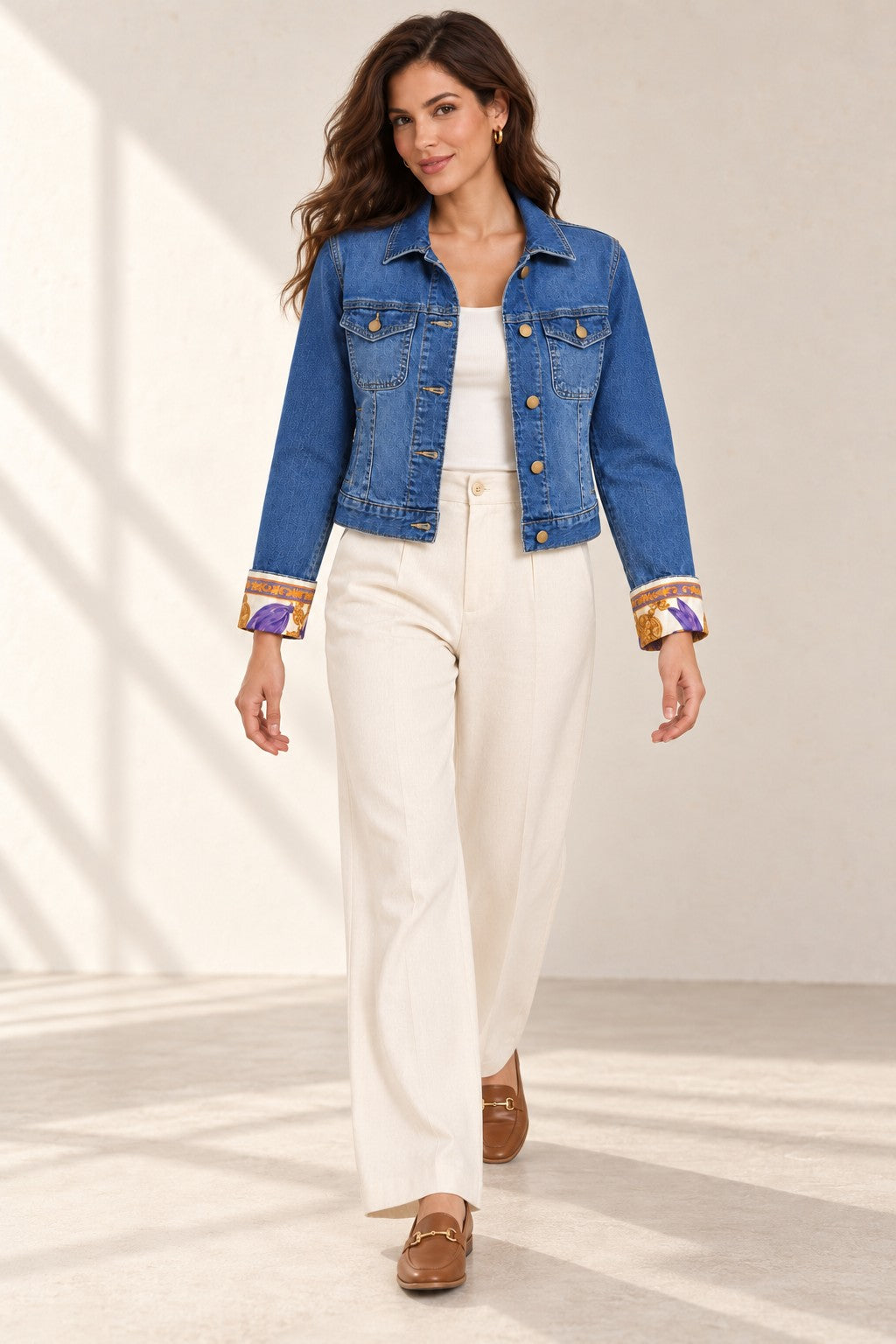 Second Soie medium blue denim jacket with vintage Christian Dior scarf cuffs, worn by a model with cream trousers.