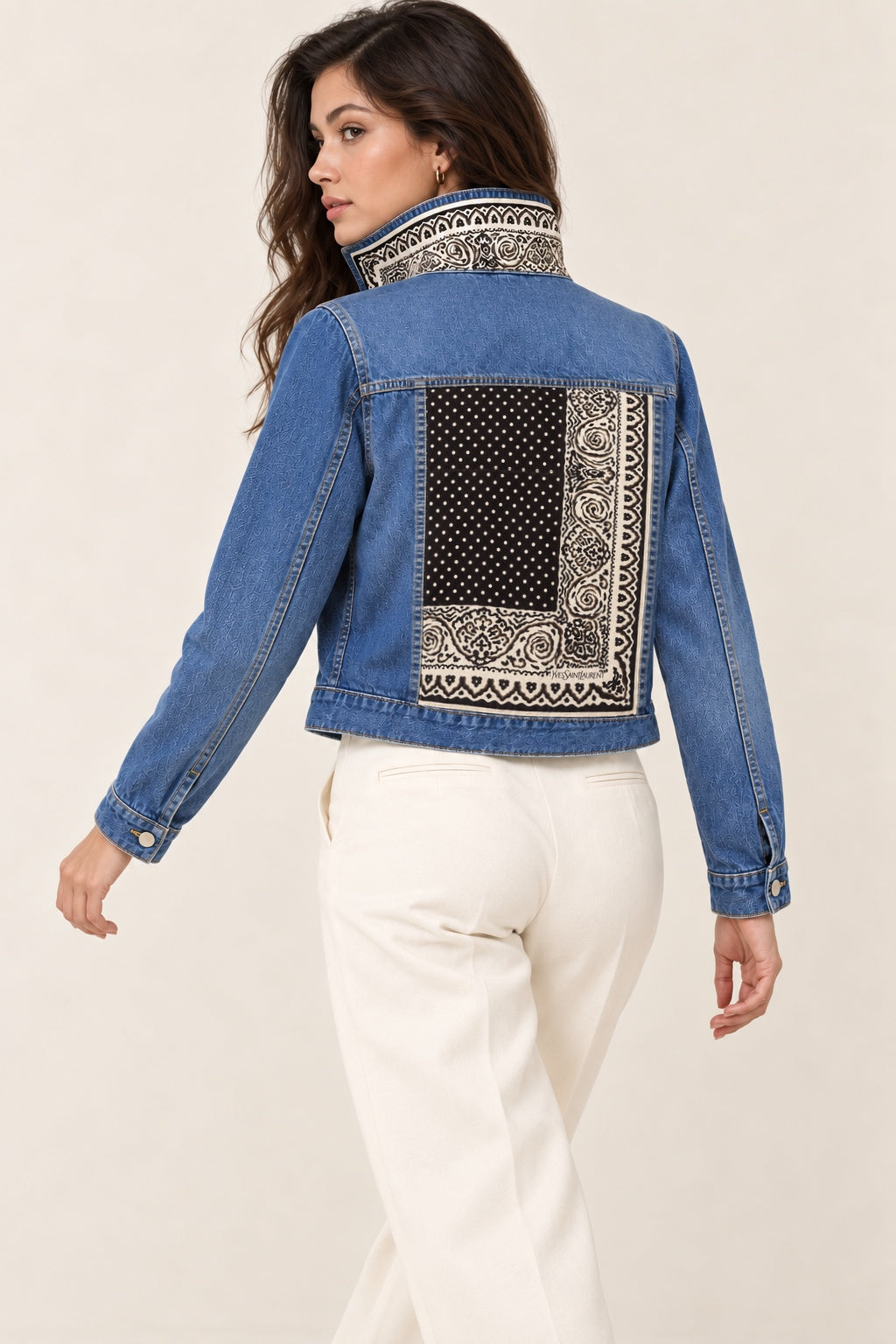 Second Soie medium-wash denim jacket with a vintage Yves Saint Laurent black and ivory paisley scarf back panel.