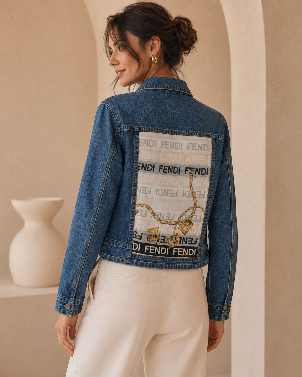 Second Soie cropped denim jacket with a vintage Fendi scarf back panel featuring a gold chain and logo motif.