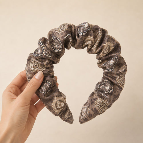Second Soie ruched headband crafted from a vintage Givenchy scarf in neutral taupe, ivory, and charcoal tones.