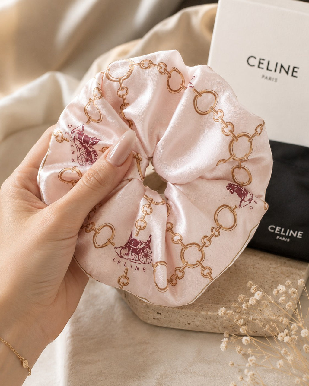 Second Soie jumbo silk scrunchie in blush with gold chain and burgundy equestrian print from a Celine scarf