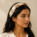 Second Soie ruched headband made from vintage Burberry cotton in ivory with camel, black, and red equestrian print.