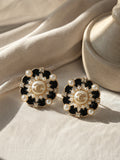 Second Soie vintage Chanel button earrings featuring black enamel, faux pearls, crystal accents, and gold-tone details.