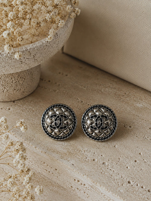 Second Soie vintage Chanel stud earrings featuring quilted silver-tone buttons with a braided border and CC logo.