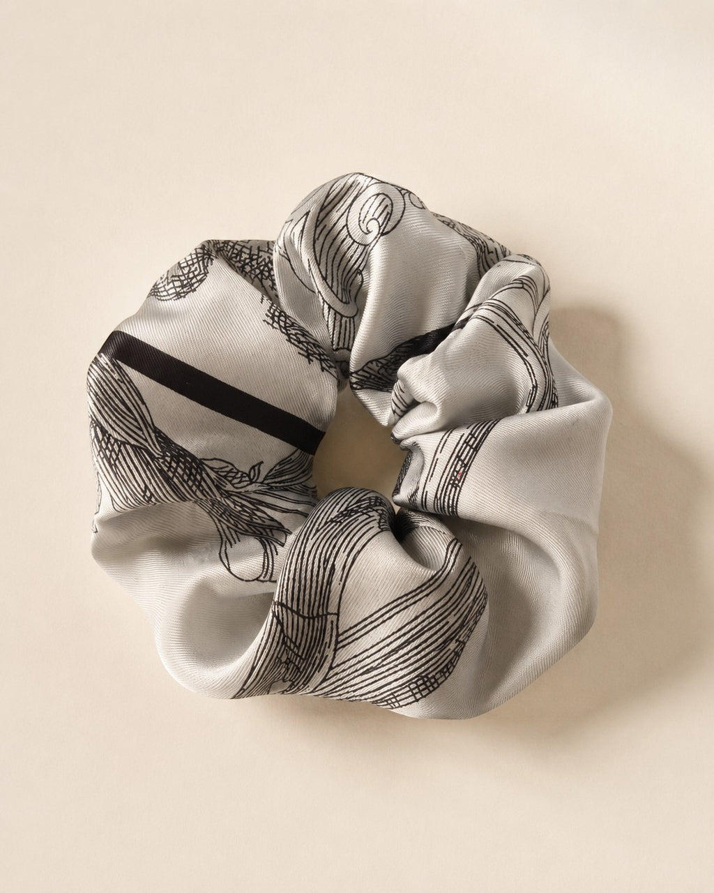 Second Soie handcrafted scrunchie made from a vintage silver-gray and black Christian Dior silk scarf