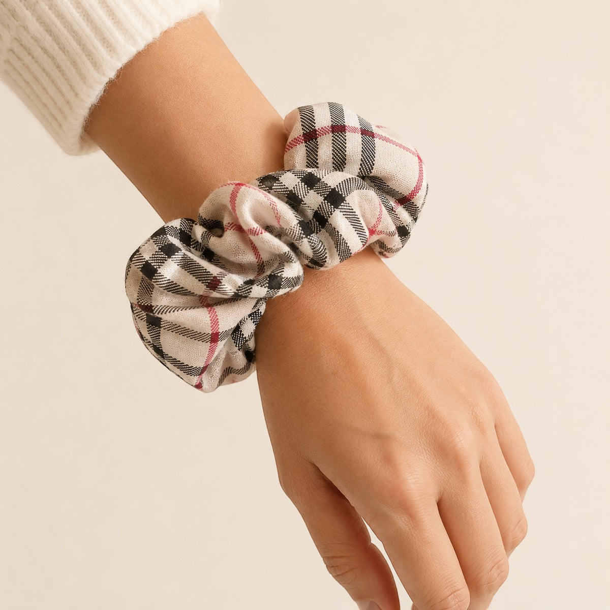 Second Soie jumbo plaid scrunchie made from vintage cotton fabric worn on a wrist as a stylish accessory