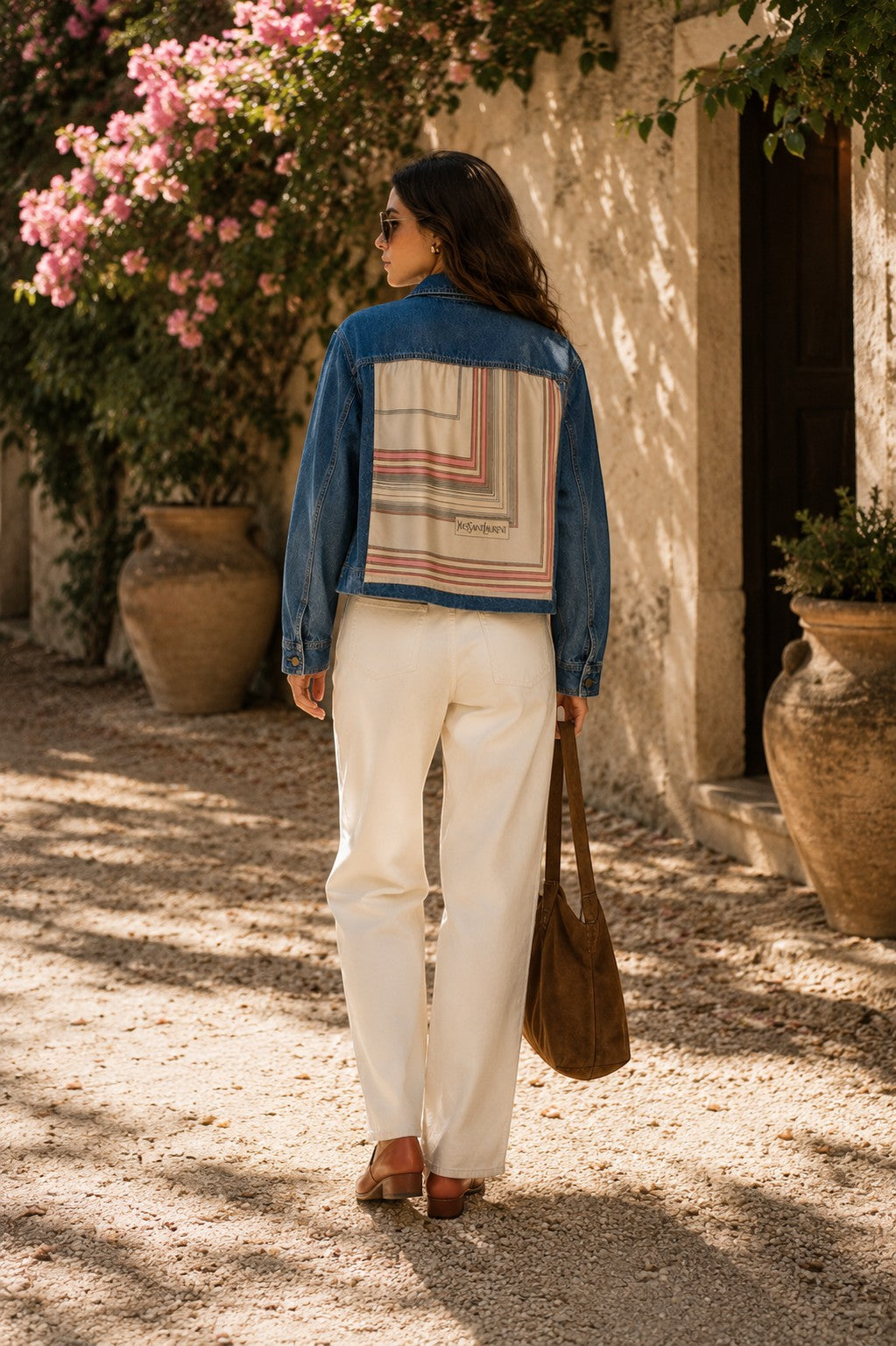 Second Soie denim jacket featuring a vintage Yves Saint Laurent scarf panel on the back in blush, ivory, and taupe.
