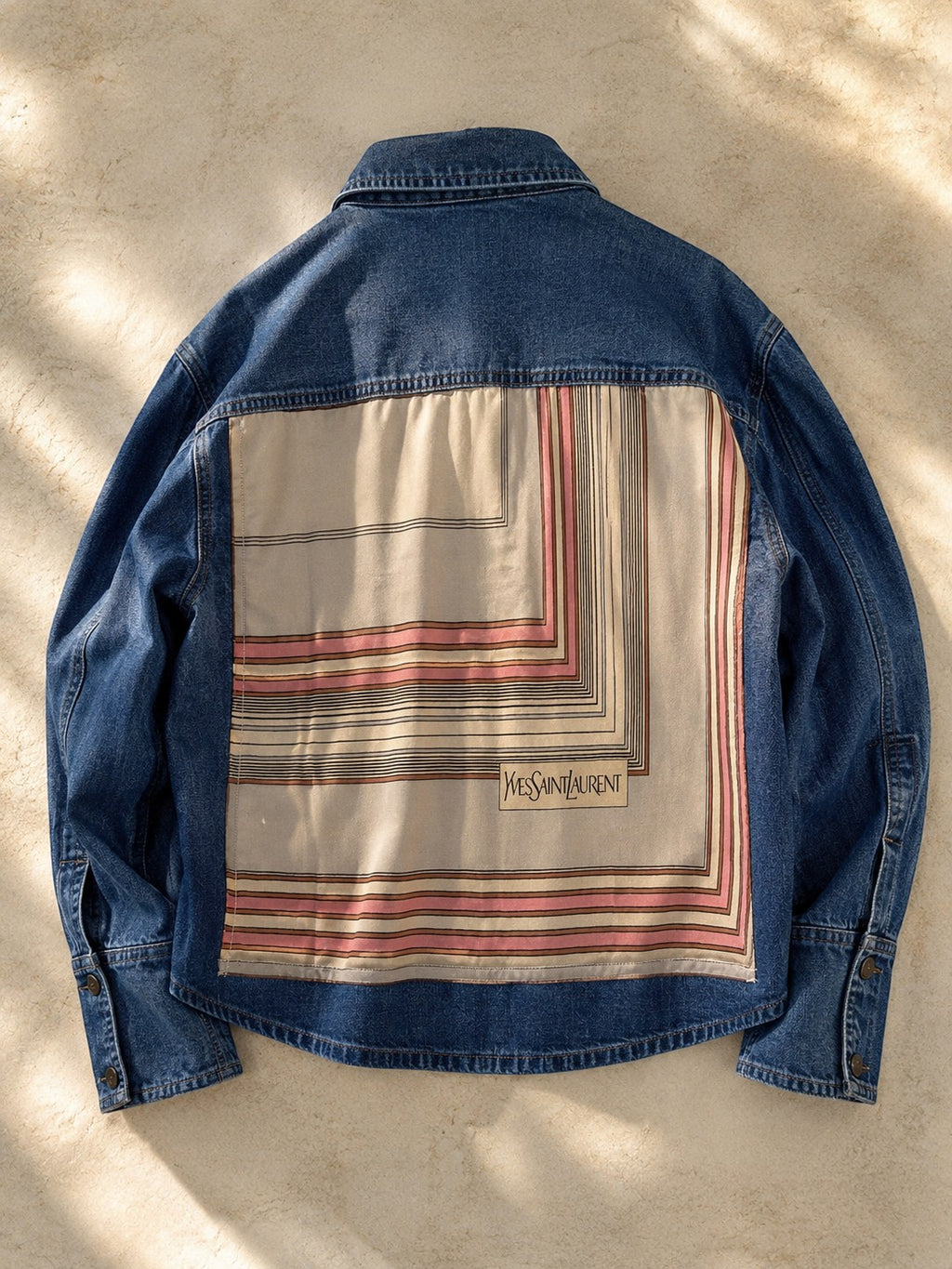Second Soie denim jacket featuring a vintage Yves Saint Laurent scarf back panel with blush, ivory, and taupe stripes.